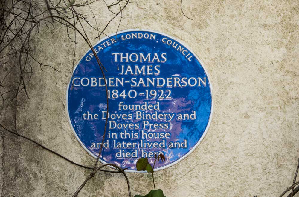  On a house adjacent to the Dove pub a blue plaque to T.J. Cobden-Sanderson reminds us he established the Doves Press here with neighbour Emery Walker.